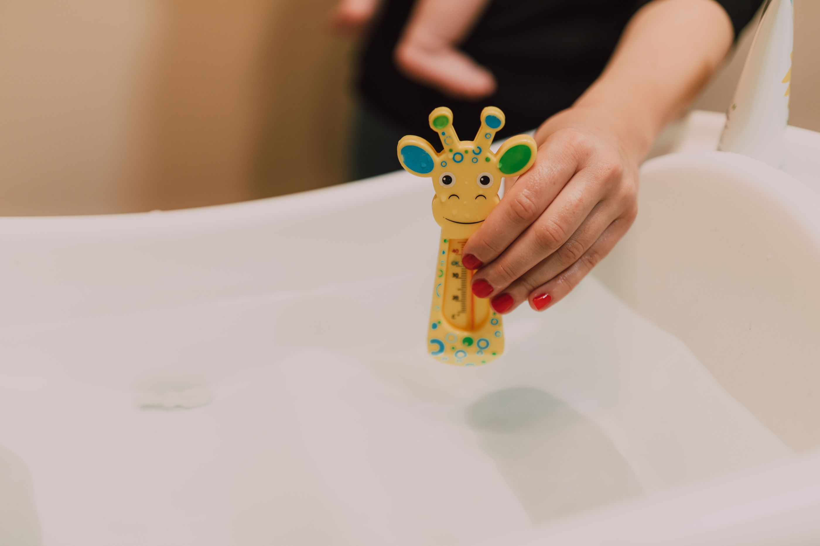 Termómetro de baño con forma de jirafa